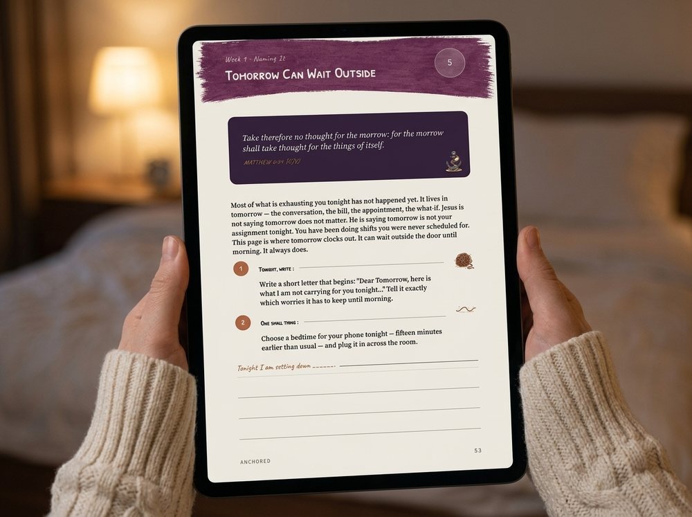 Two hands holding a tablet at night, an evening page open on the screen